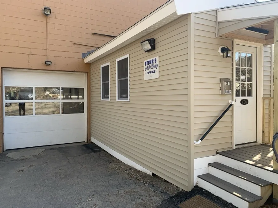 Steve's Auto Body shop exterior and office entrance in Norwell, MA
